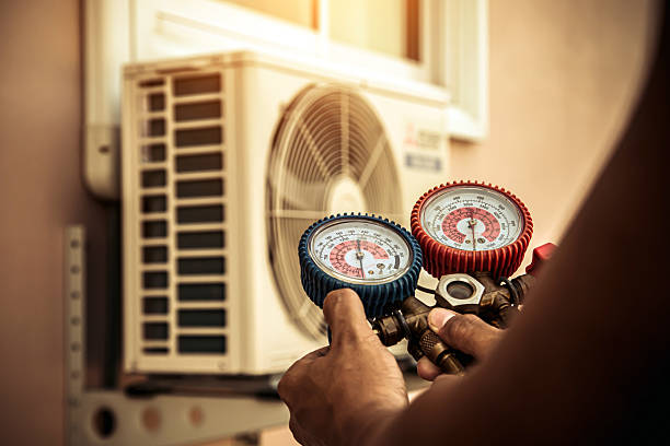 Professional Air Conditioning Service technician working in Arnold, MD